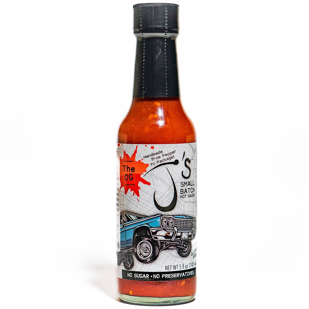 Hot sauce bottle with a colorful label on a white background