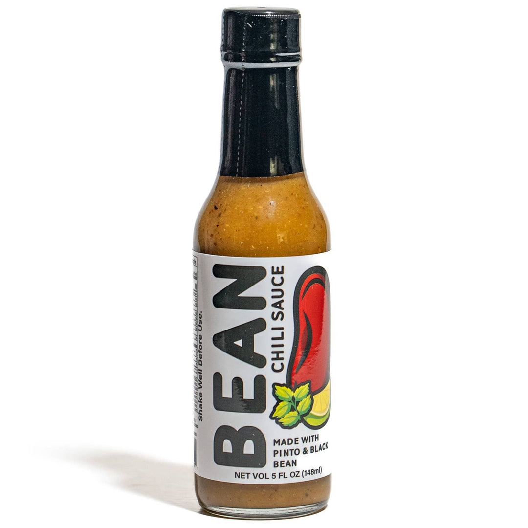 Bottle of Bean chili sauce on a white background