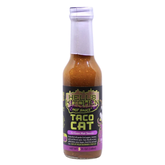 Bottle of Hell's Kitchen Taco Cat hot sauce on a white background